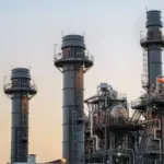 Gas turbine electrical power plant at dusk with twilight